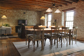 Dining and living space interior of the Stonehouse